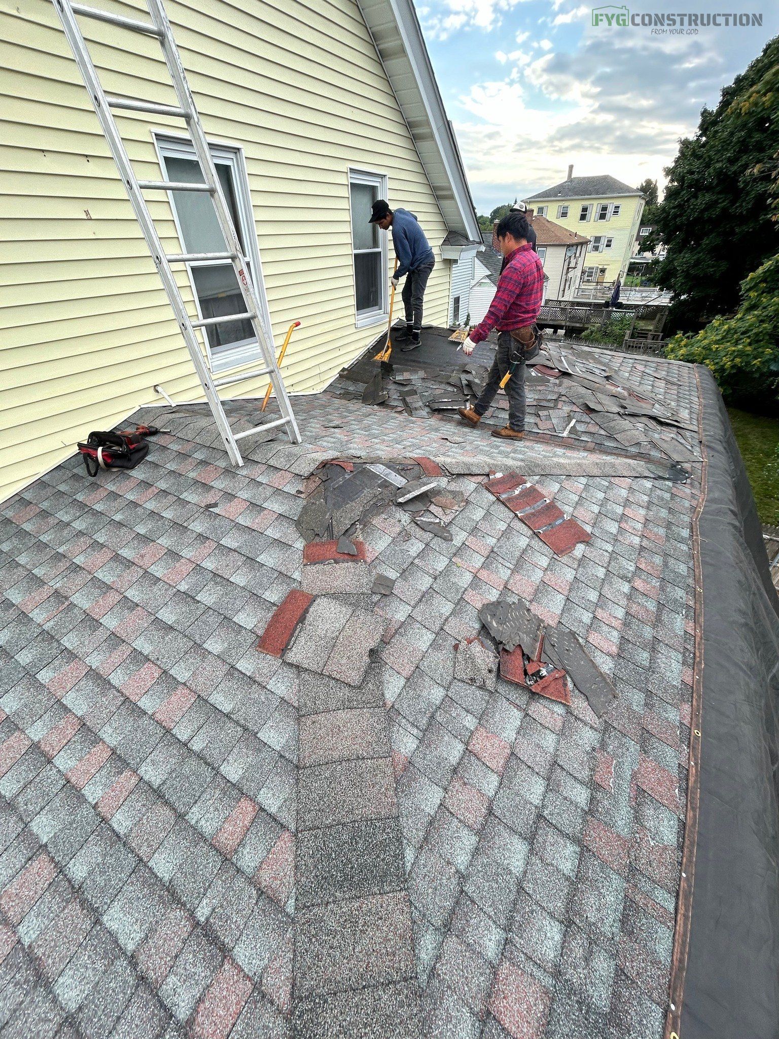 Roofers working on South Kingstown property