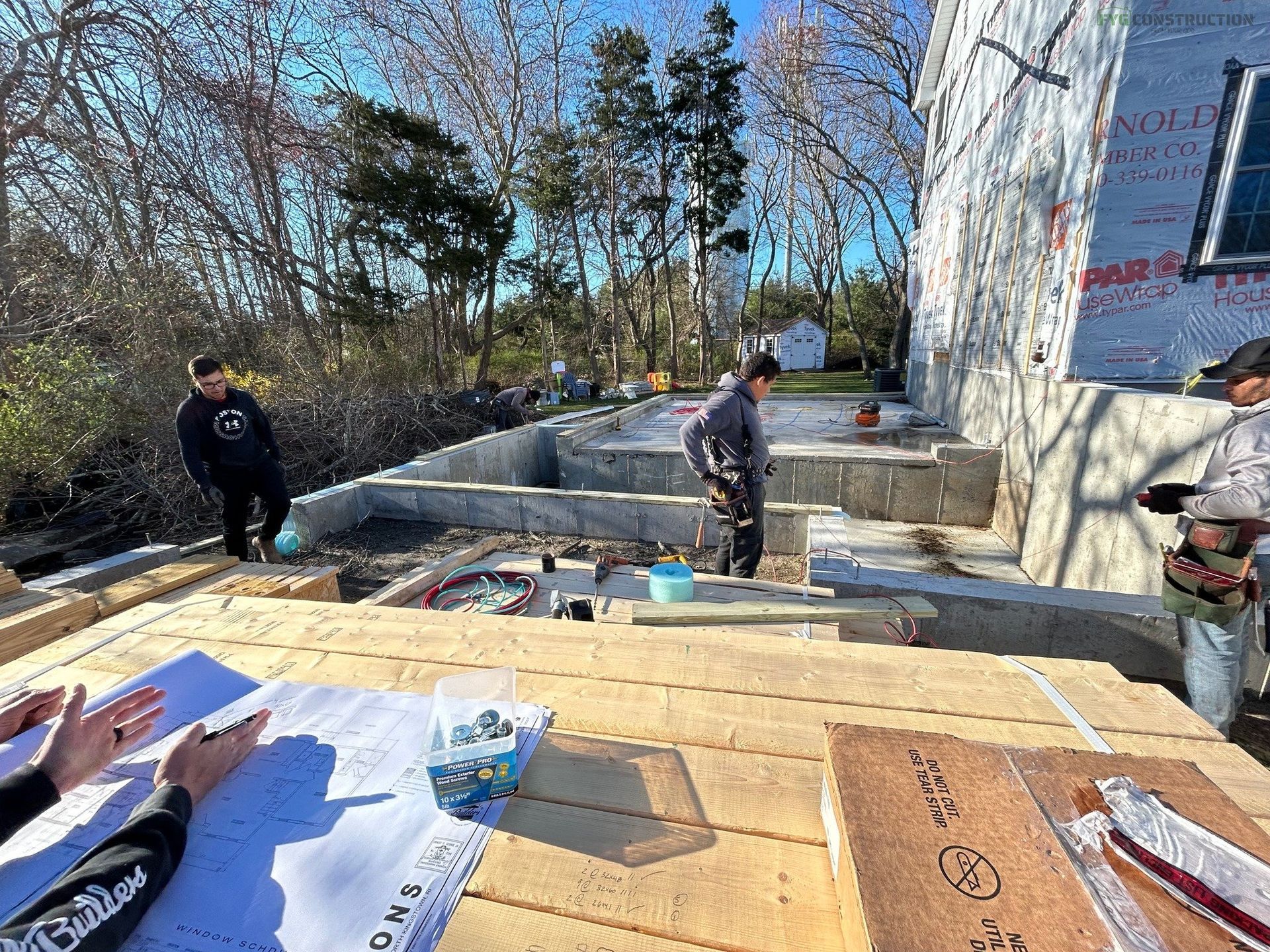 South Kingstown contractors preparing roof for installation