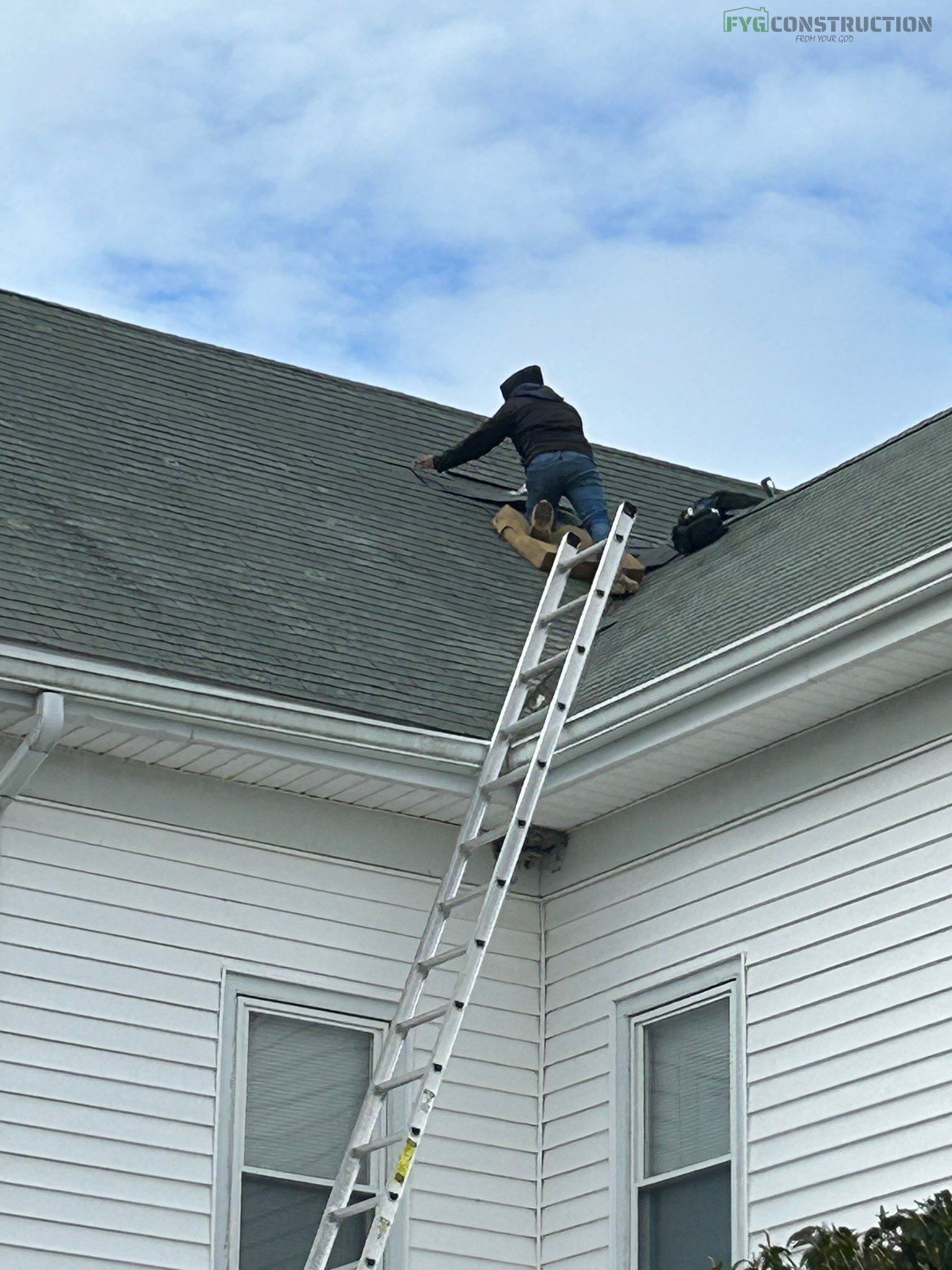 Roof contractor fixing a roof in South Kingstown