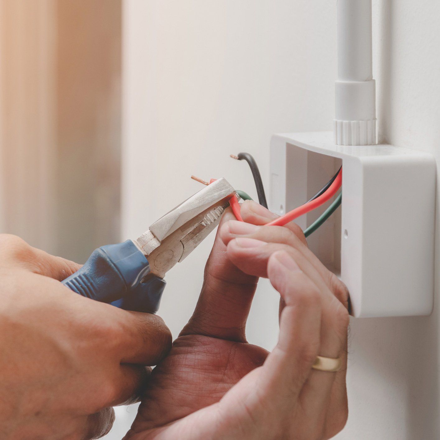 Residential Electrician  — Installing The Power Plug in Riverside, CA