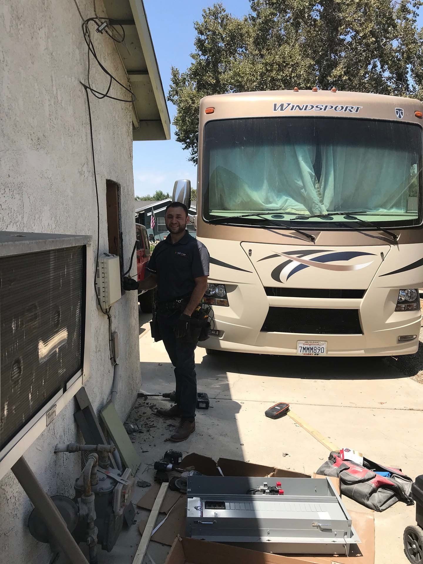 Electrician Fixing a Fuse Box — Riverside, CA — Volt Tech Electric