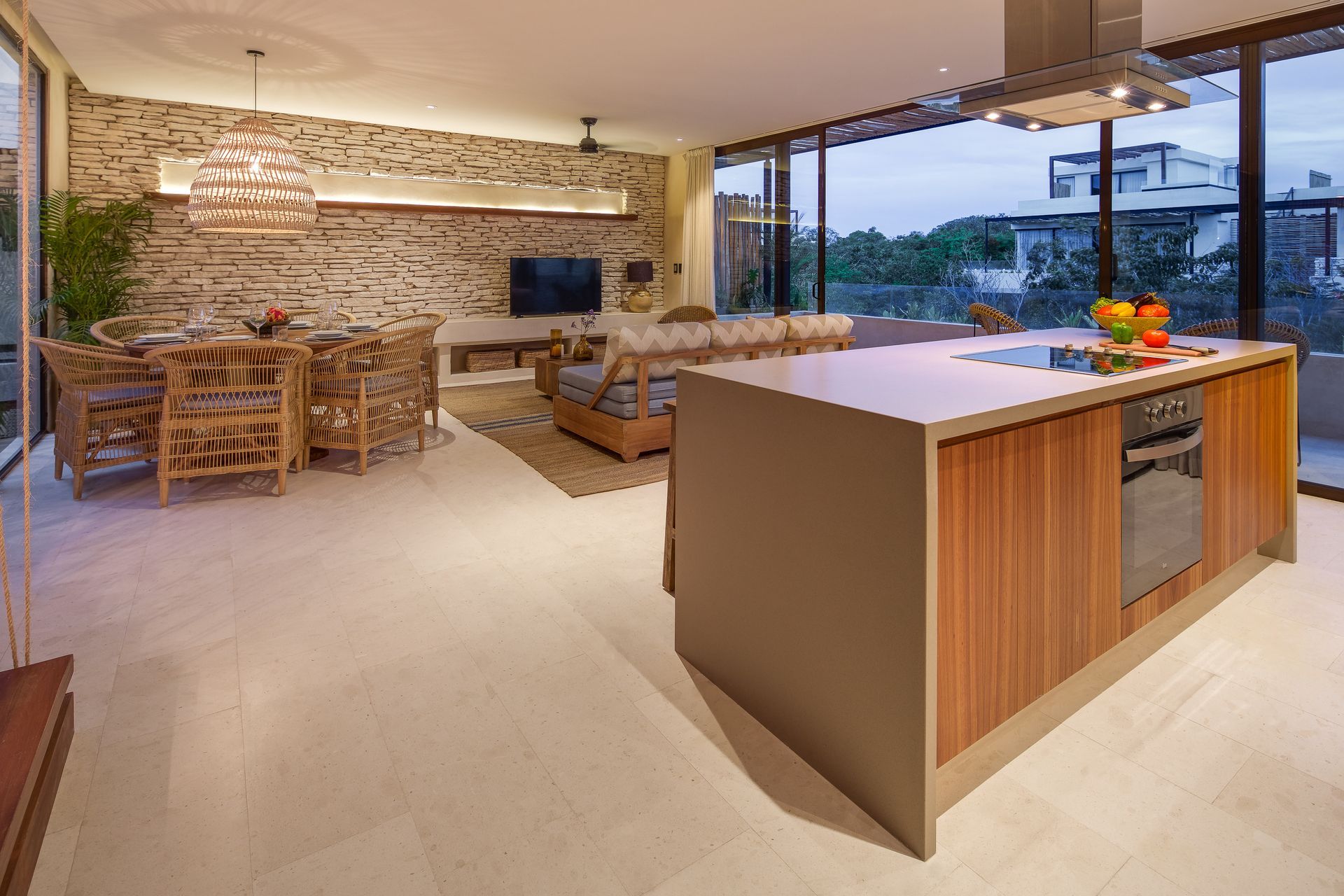A kitchen with a large island in the middle of the room.