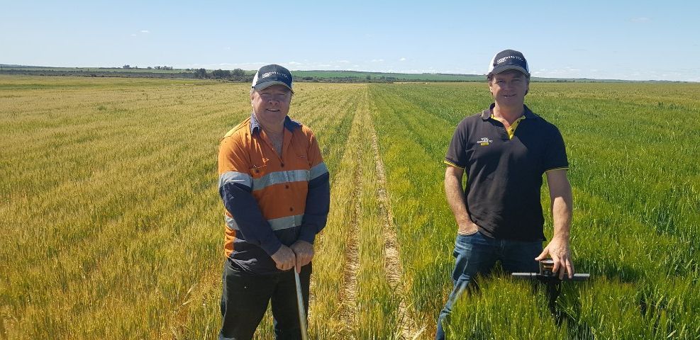 Grant Borgward and a farmer