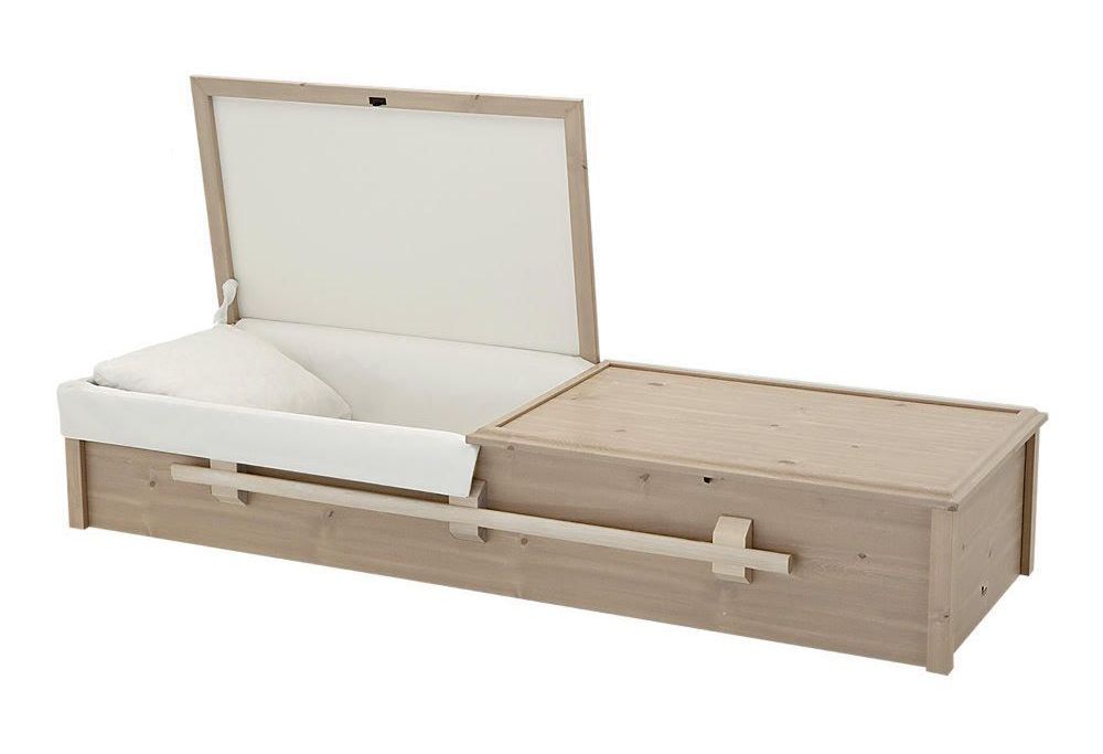 wooden cremation casket with a white liner and handles