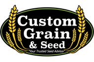 Logo for Custom Grain & Seed: black oval with white text, wheat stalks, and tagline "Your Trusted Seed Advisor."
