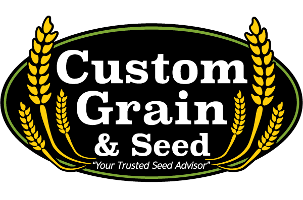 Logo for Custom Grain & Seed: black oval with white text, wheat stalks, and tagline "Your Trusted Seed Advisor."