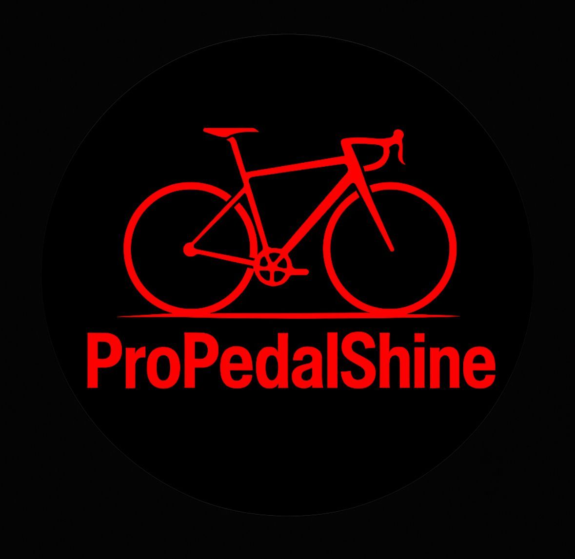 Red bicycle outline and text