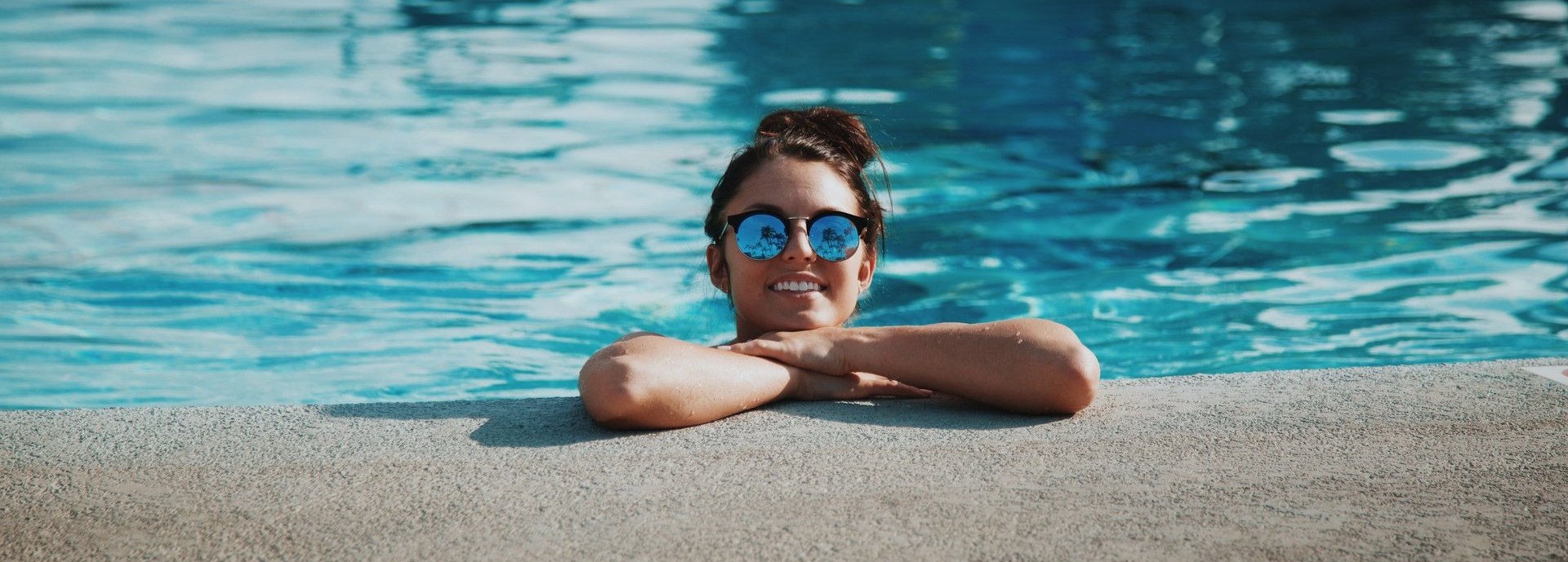 Woman Enjoying Swimming Pool