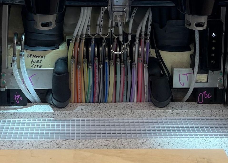 The inside of a professionally installed soda fountain