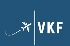 A blue background with a white airplane and the word vkf
