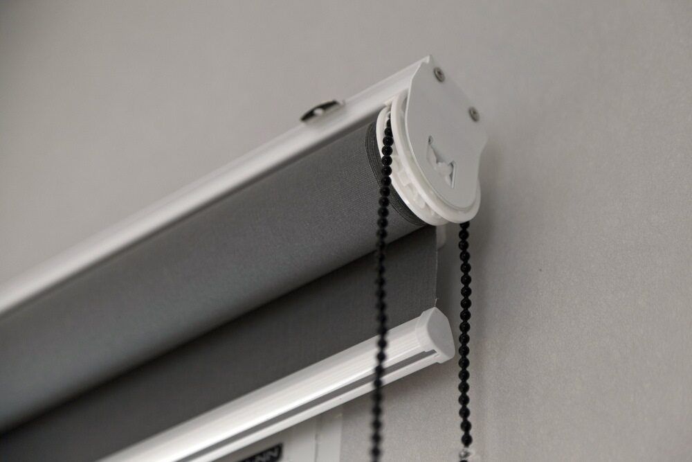 A Close Up Of A Roller Blind With Chains Attached To It — Summerland Screens & Awnings In Ballina, NSW