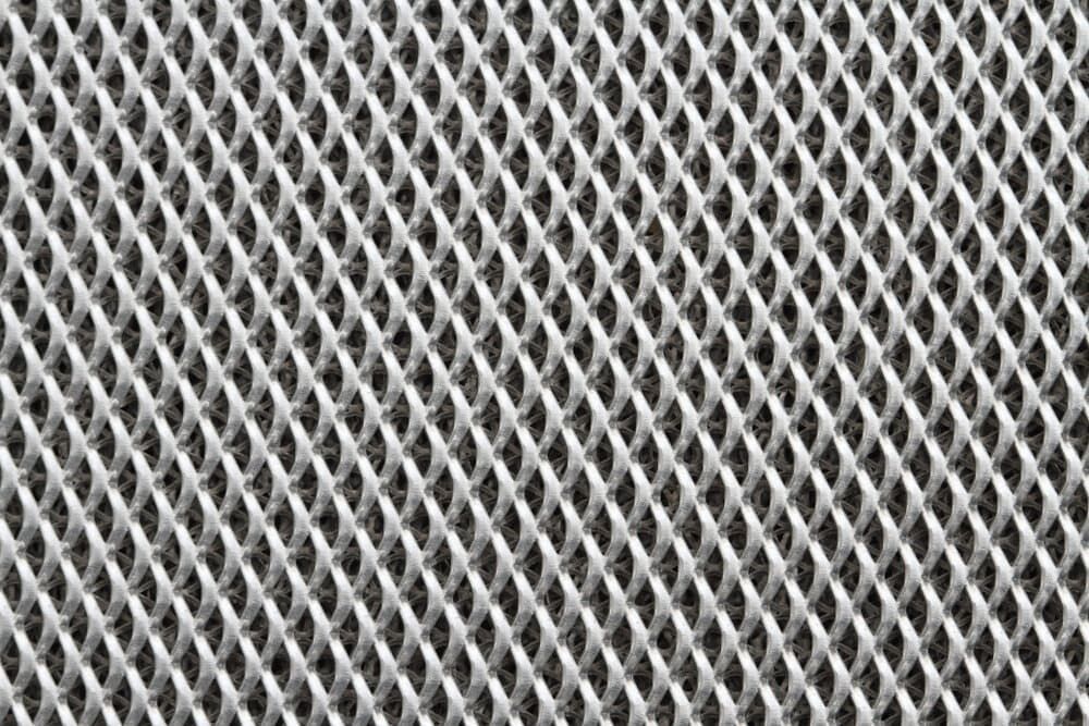 A Close Up Of A Metal Mesh Texture — Summerland Screens & Awnings In Suffolk Park, NSW