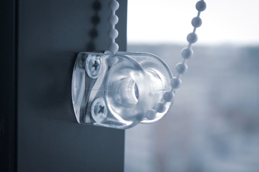 A Close Up Of A Roller Blind Mechanism On A Window — Summerland Screens & Awnings In Ballina, NSW