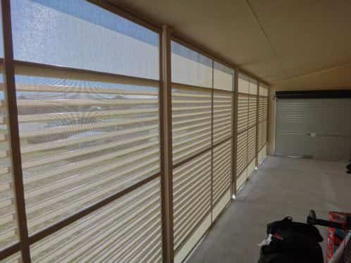 A Large Room With A Lot Of Windows And Blinds — Summerland Screens & Awnings In Lennox Head, NSW