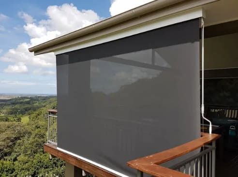A Balcony With A Gray Blind On The Side Of It — Summerland Screens & Awnings In Evans Head, NSW