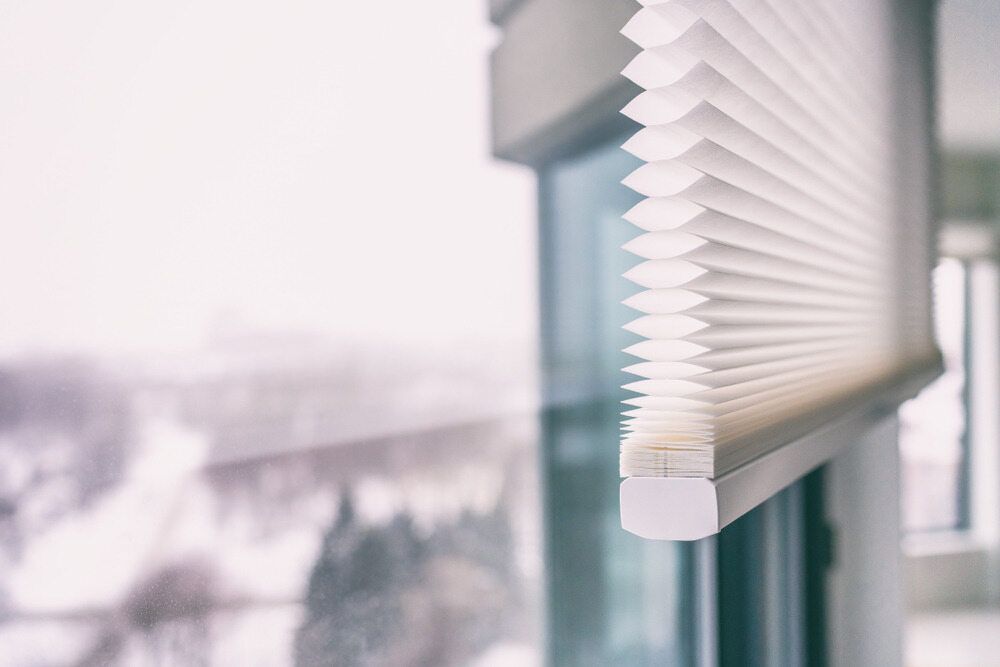 A Close Up Of A Honeycomb Blind On A Window — Summerland Screens & Awnings In Lismore, NSW