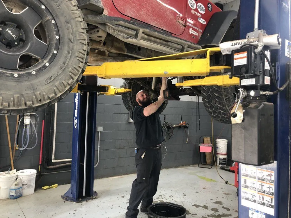 Mechanic Udner car | CARS Plus! Auto Repair