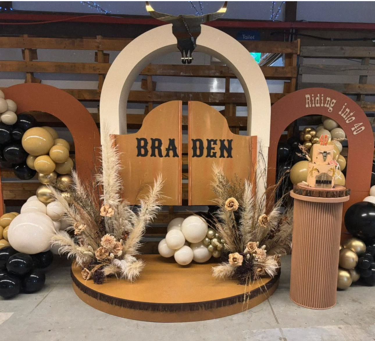 Western-themed birthday party backdrop with