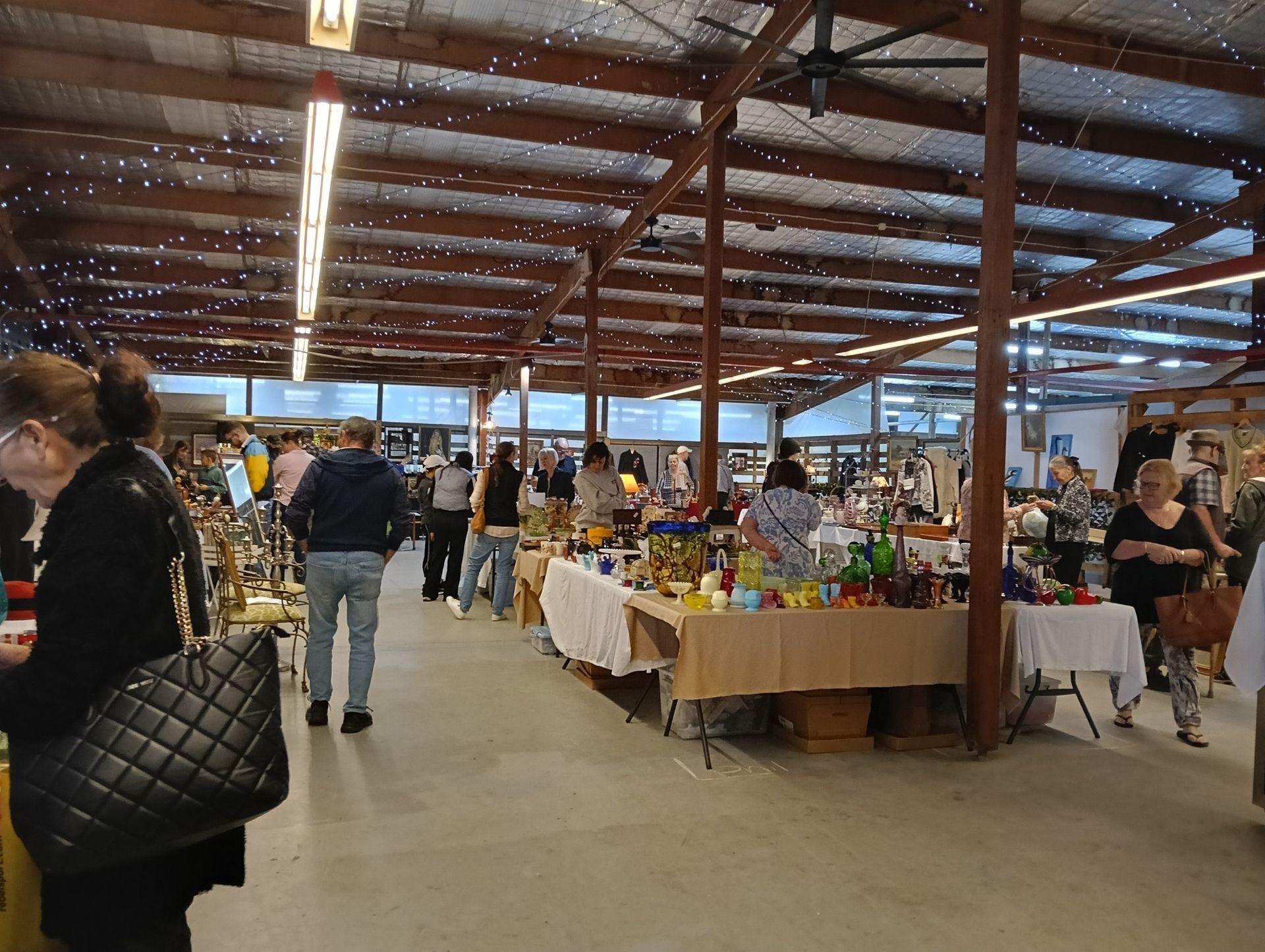 Indoor Market, People Browsing Stalls With Various Crafts — Rustique on the Coast In Ourimbah, NSW