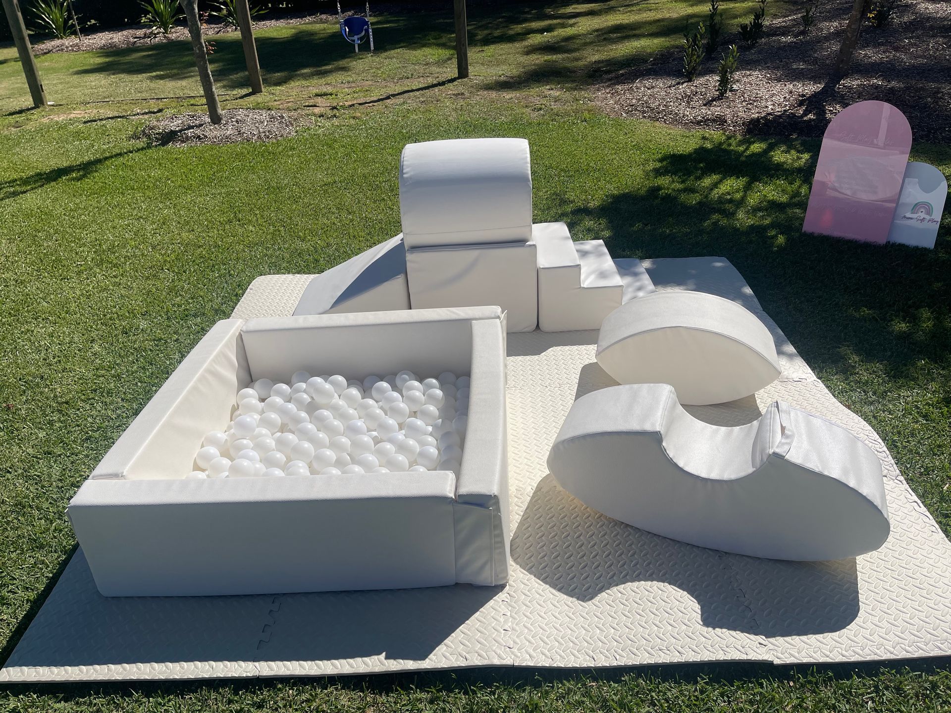 A White Inflatable Bounce House — Rustique on the Coast In Ourimbah, NSW