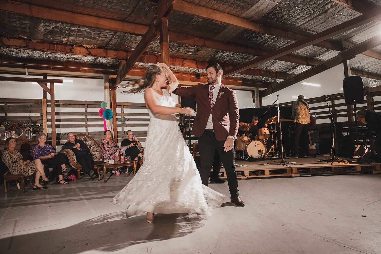 Bride and Groom Dance at Reception in a Rustic Barn — Rustique on the Coast In Ourimbah, NSW