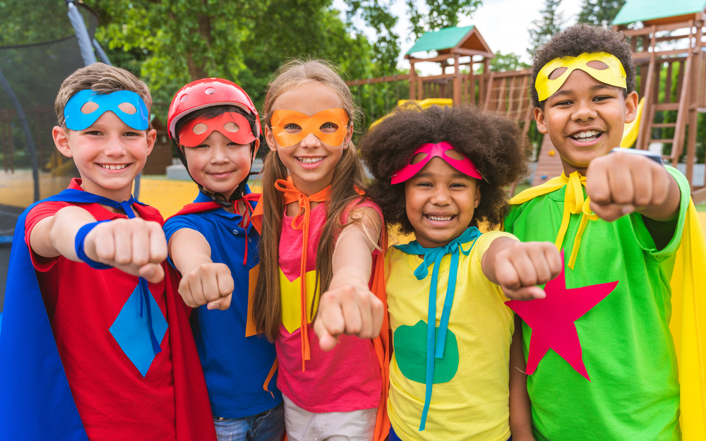 Five Children in Superhero Costumes Smile and Pose — Rustique on the Coast In Ourimbah, NSW