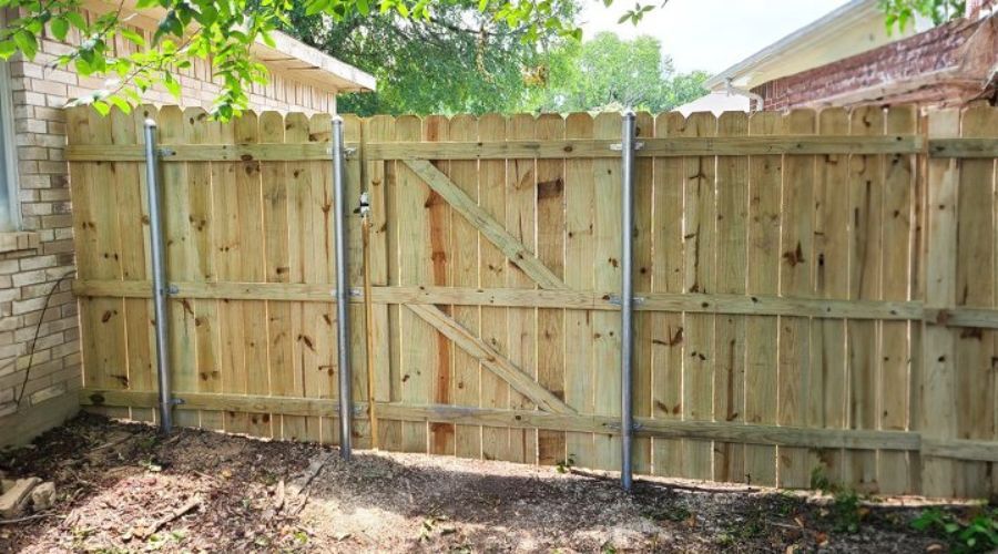 Reinforced wooden privacy gate for residential security