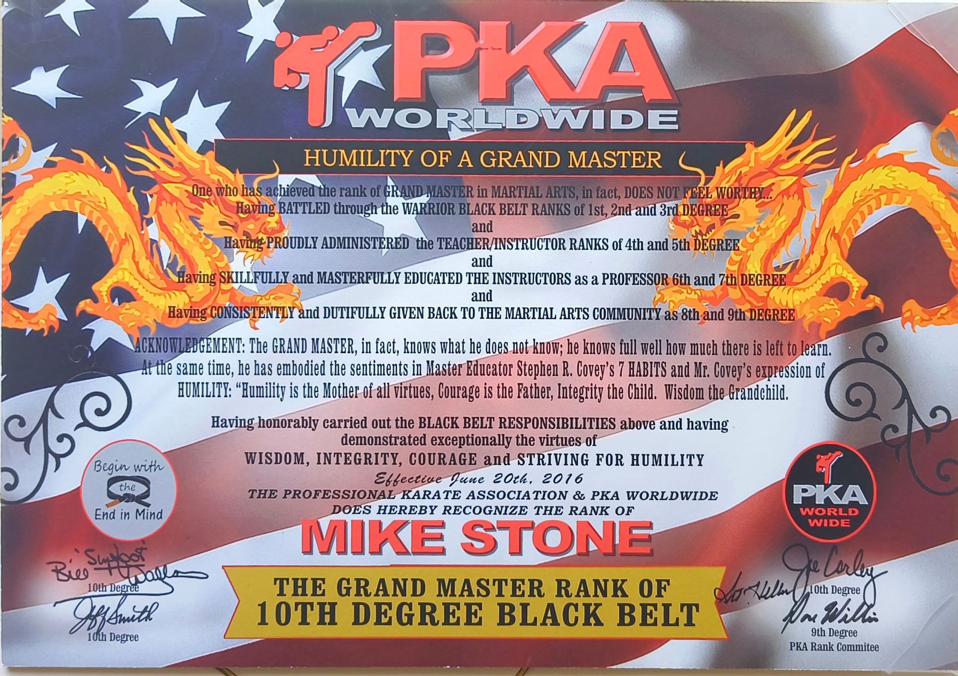 Certificate for Mike Stone, 10th Degree Black Belt, from PKA Worldwide, with an American flag background and dragon design.