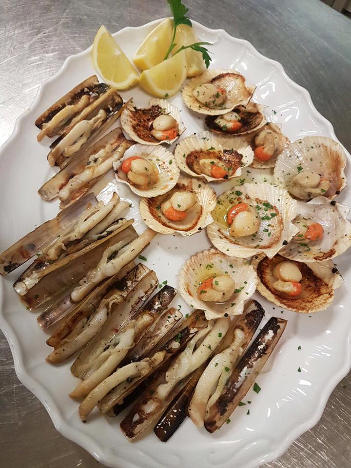 antipasto di molluschi servito da ristorante di pesce a Treviso e provincia