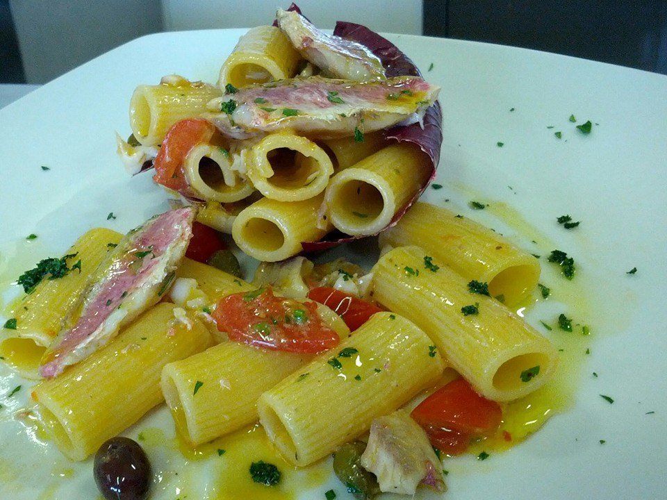 rigatoni con frutti di mare serviti in ristorante di pesce a Treviso e provincia