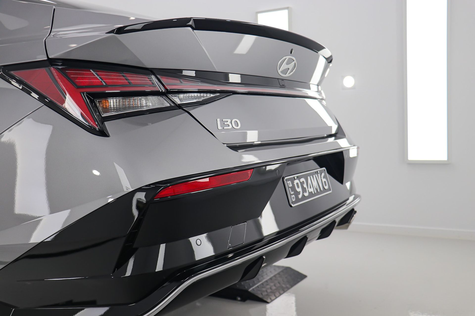 Red Tesla car rear with 