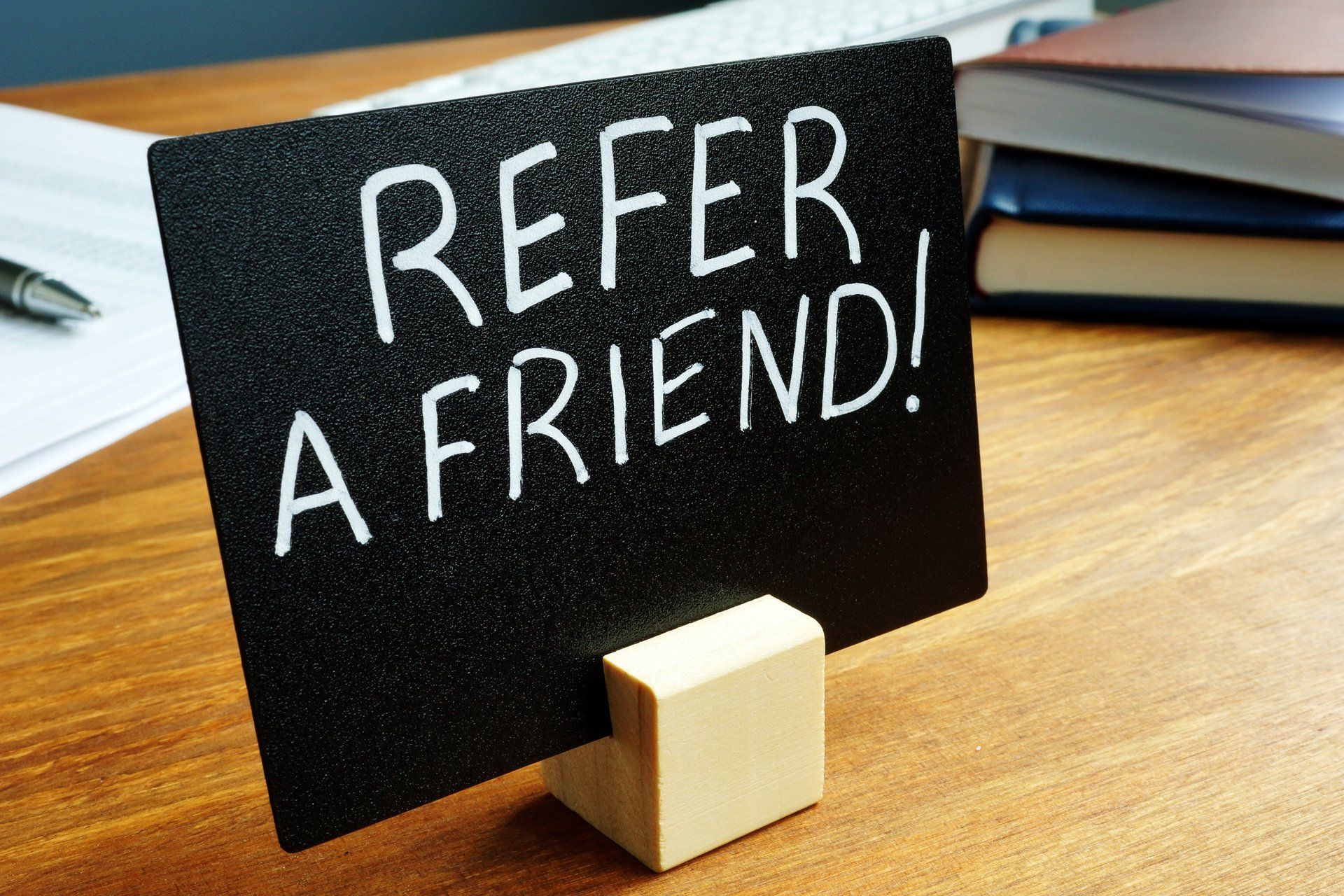Refer A Friend Text On Black Note — Houston, TX — Next Step Academy