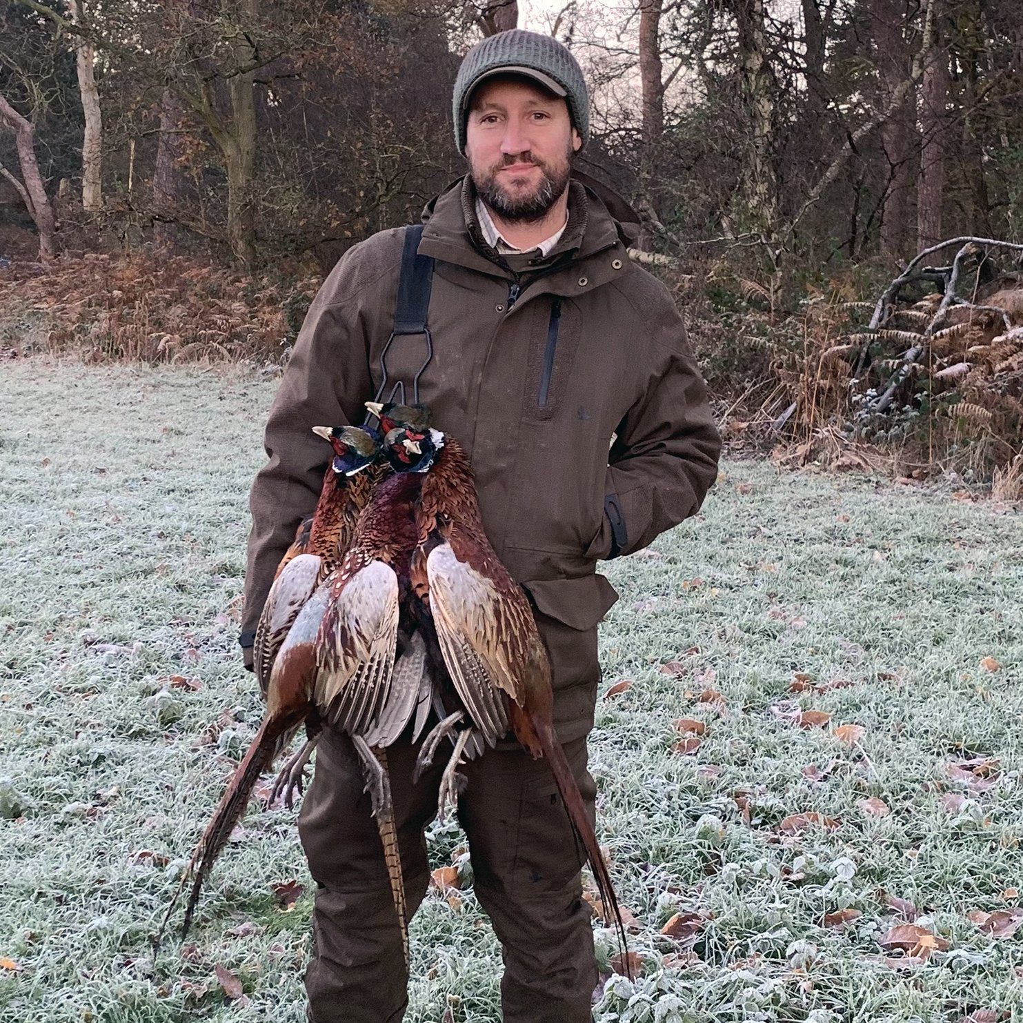 Andy in a frosty field after a pheasant shoot