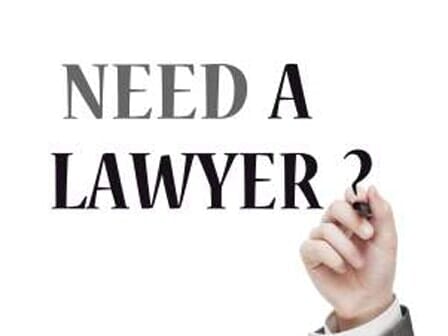 Need a Lawyer Sign - Law Offices of Andrew J. Zaroulis in Lowell, MA
