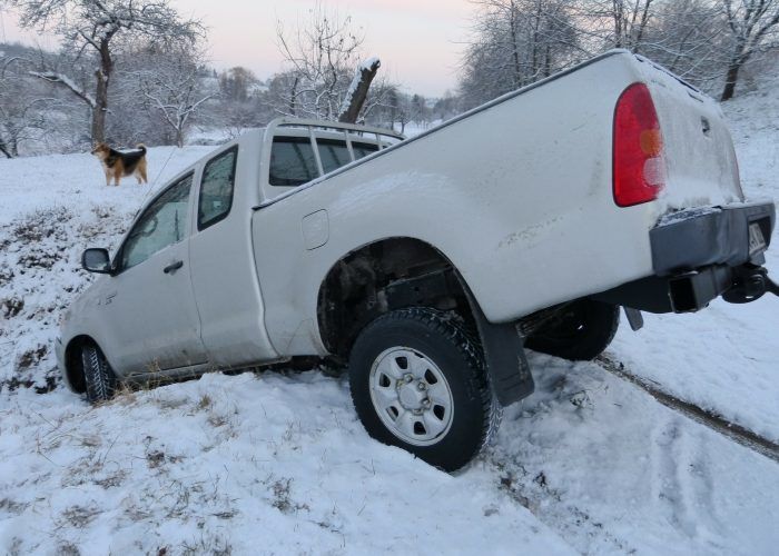 A truck that slid into a ditch in the snow in red deer