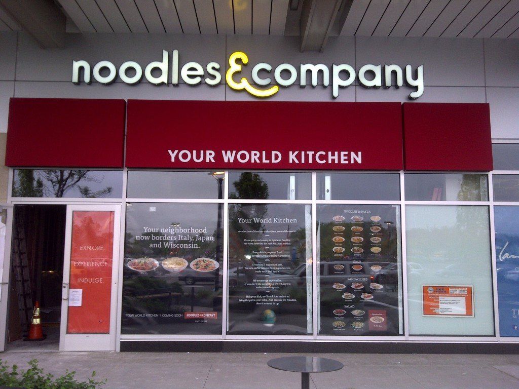 Noodle & Company channel letter sign, business awning sign and window graphics