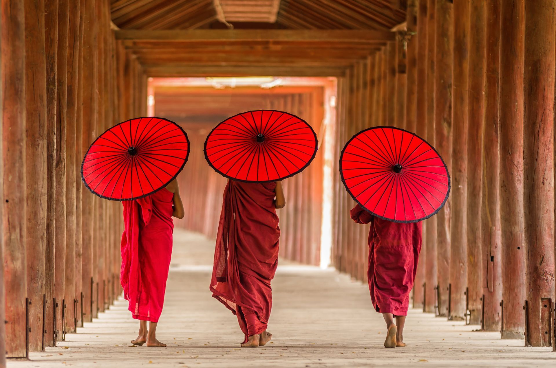 Buddhists walking in pagoda, Myanmar