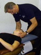 Chiropractor Using A Tool For Spinal Treatment — Chico, CA — Dollinger Chiropractic Clinic