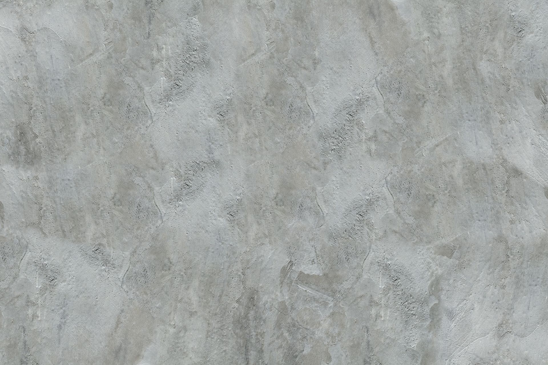 Gray concrete wall with rough texture and subtle variations.