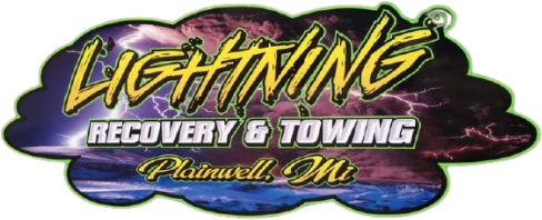Logo for Lightning Recovery & Towing, Plainwell, MI. Features lightning design with dark blue and yellow text.