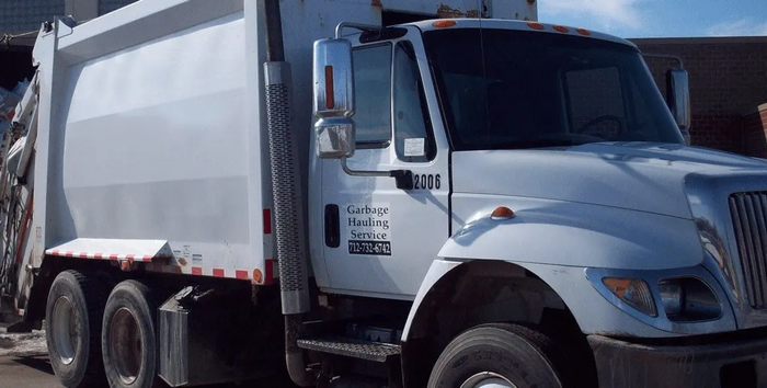 Rear End Of Garbage Dumper Truck — Storm Lake, IA — Garbage Hauling Service Inc