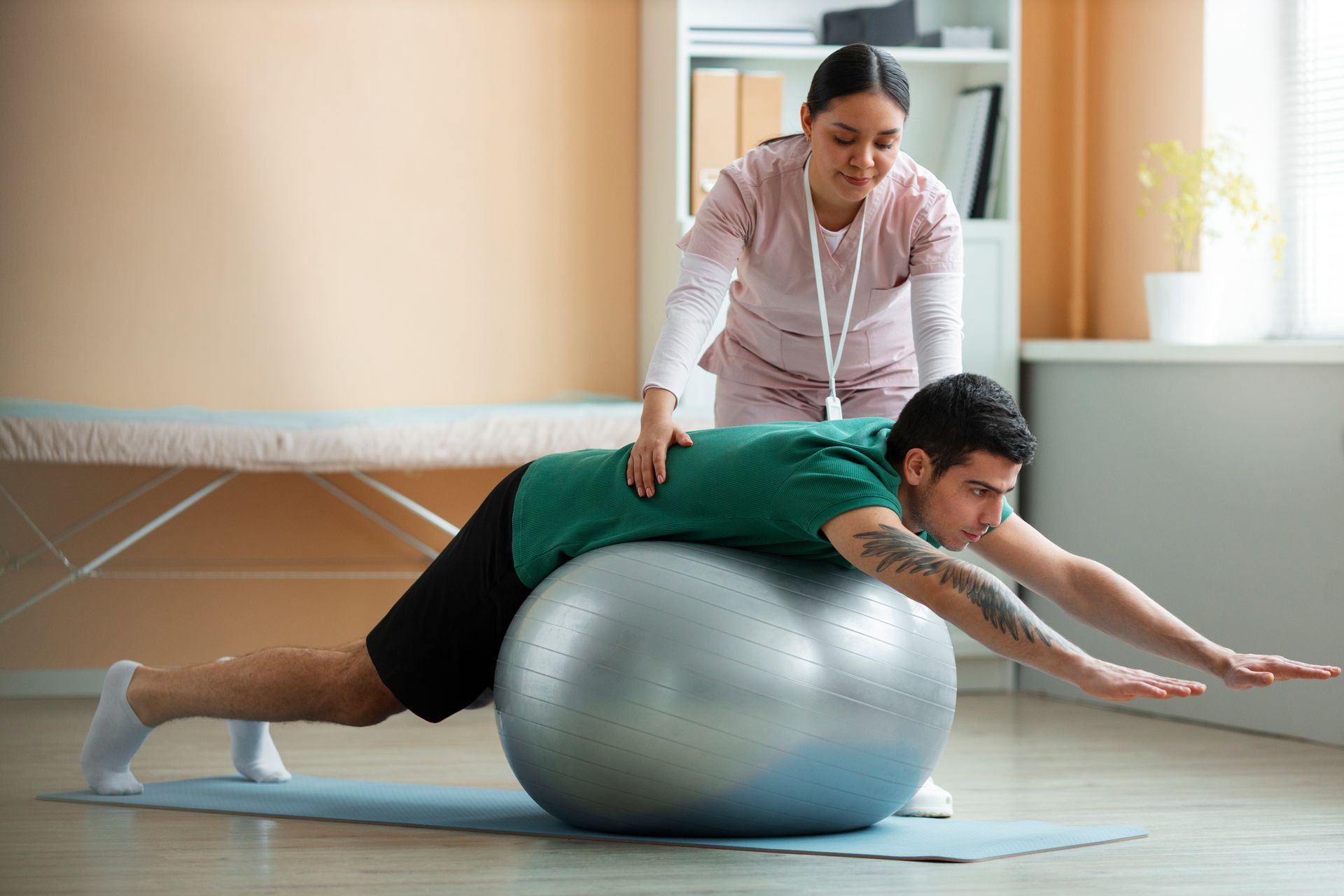 physiotherapy on exercise ball