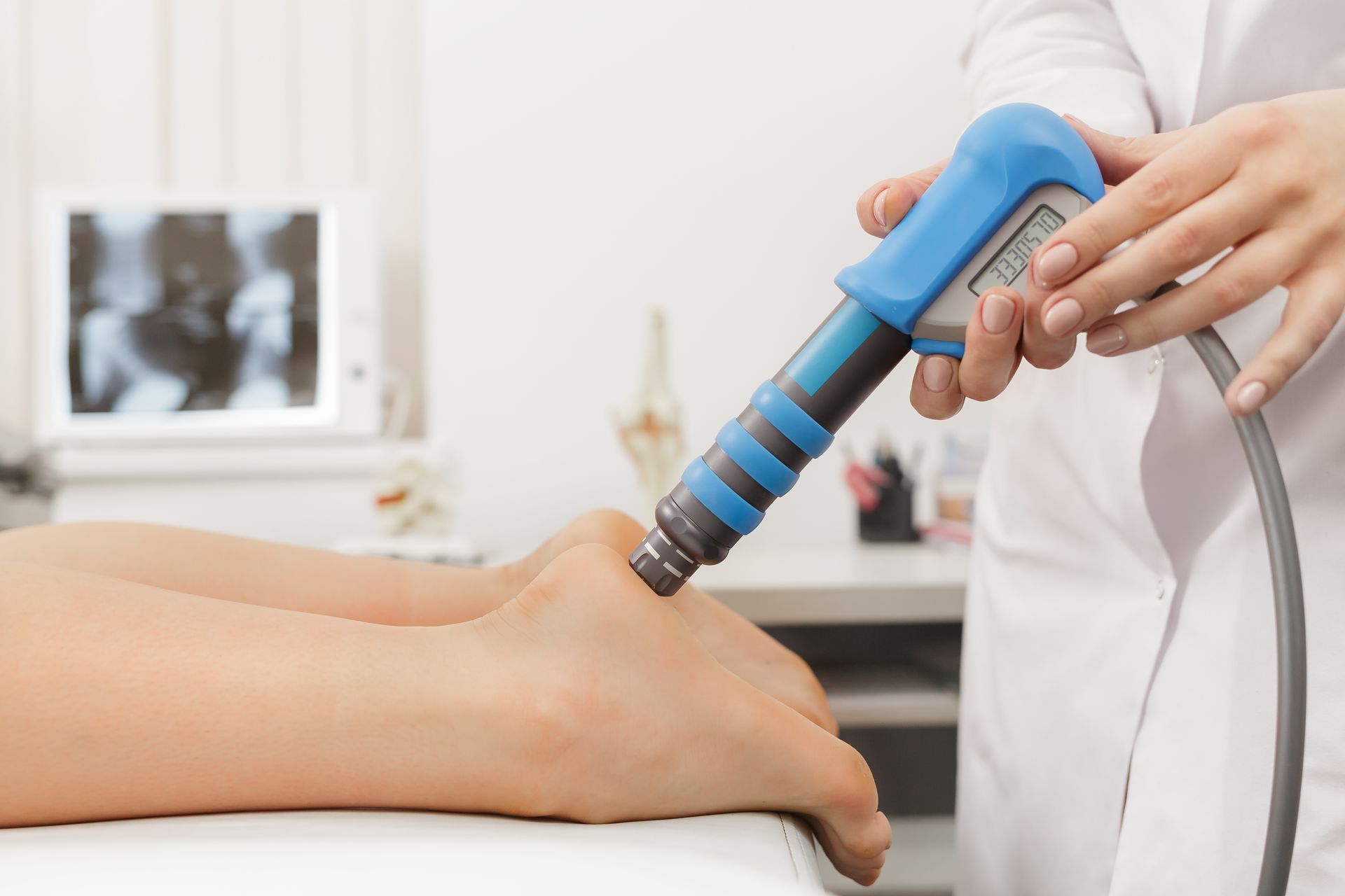 person receiving shockwave therapy