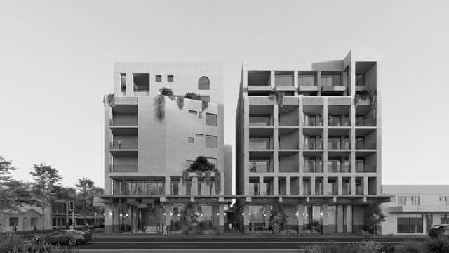Black-and-white view of a multi-story building with a grid facade and ground-floor shops.