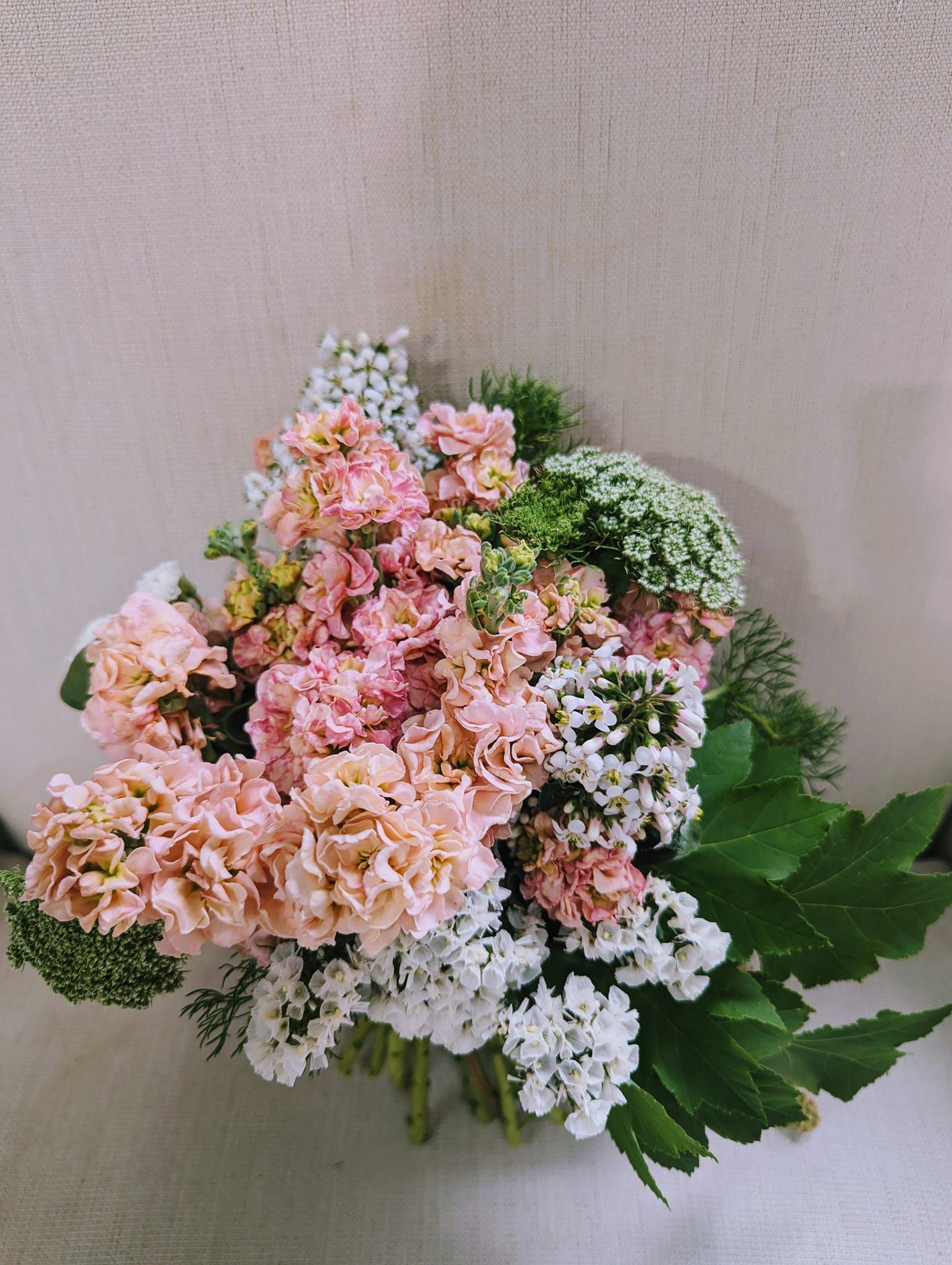 A Close Up of a Bouquet of Pink and White Flowers on a Table — Hello Poppy Lane Florist In Albury, NSW
