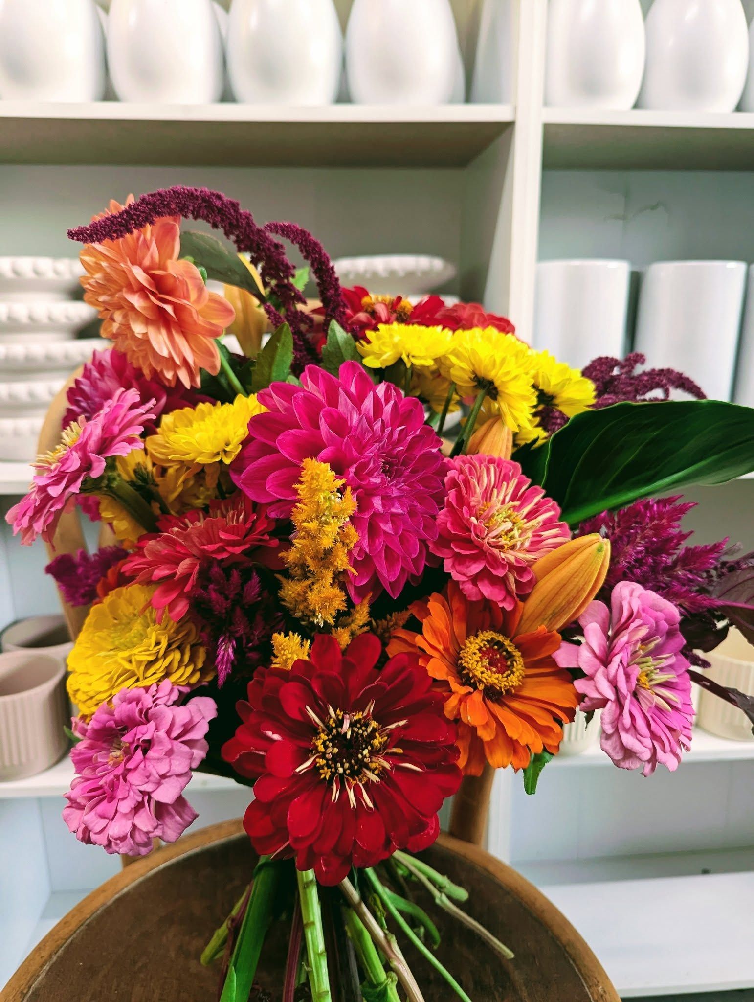 A Bouquet of Colorful Flowers is Sitting on a Table — Hello Poppy Lane Florist In Albury, NSW