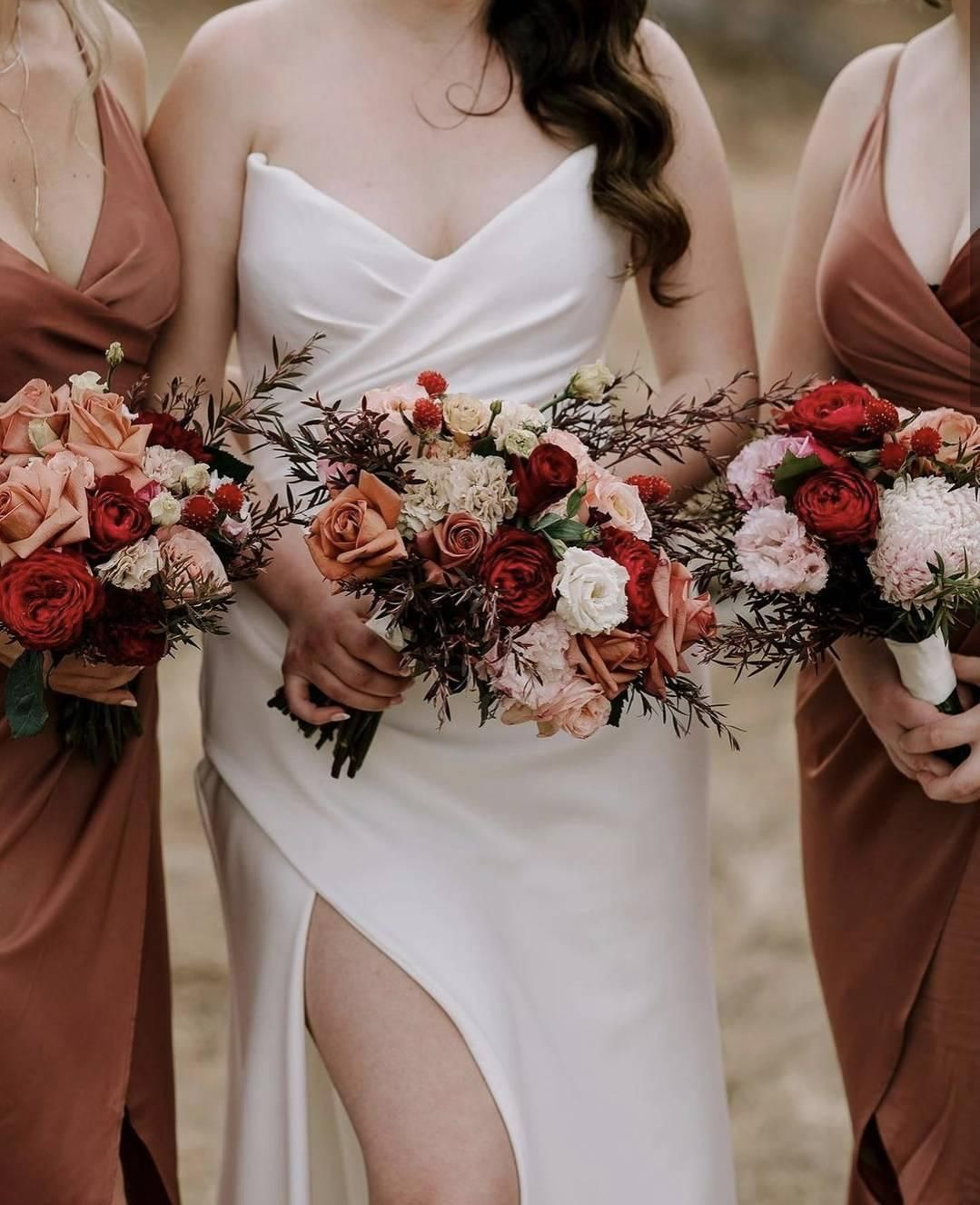 A Bride and Her Bridesmaids Are Holding Bouquets of Flowers — Hello Poppy Lane Florist In Wodonga, VIC