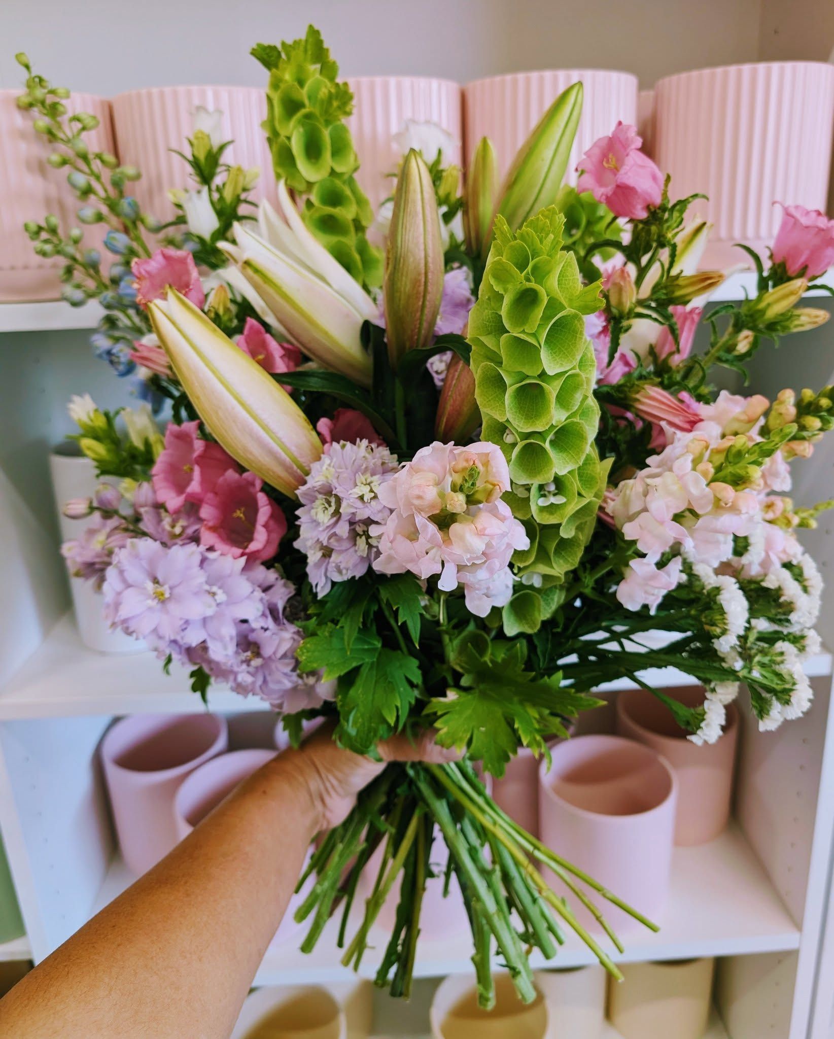 A Bunch Of Fresh Flowers On A Hand