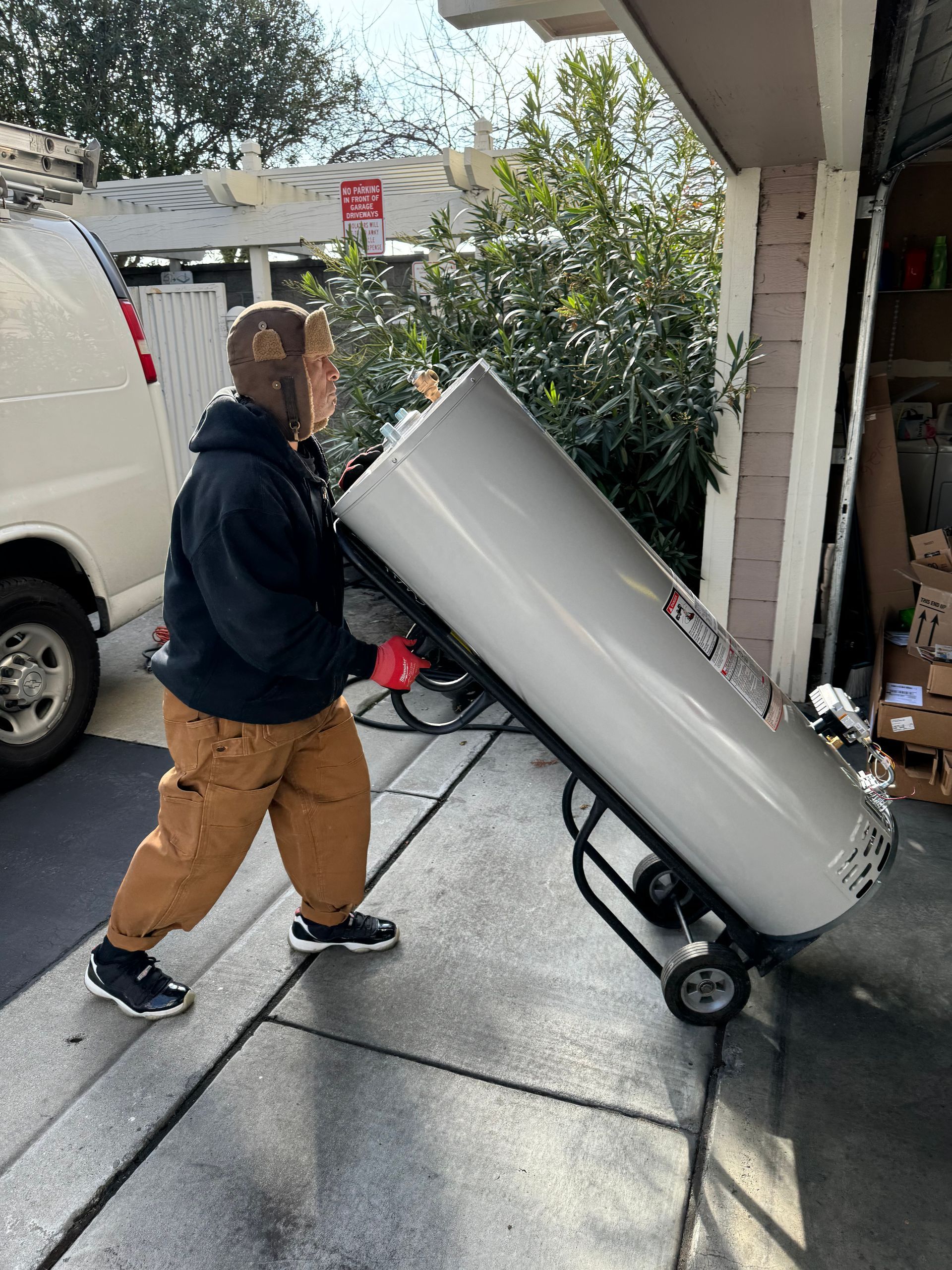 Man Carrying Water Heater - San Jose, CA - Efficient Water Heaters