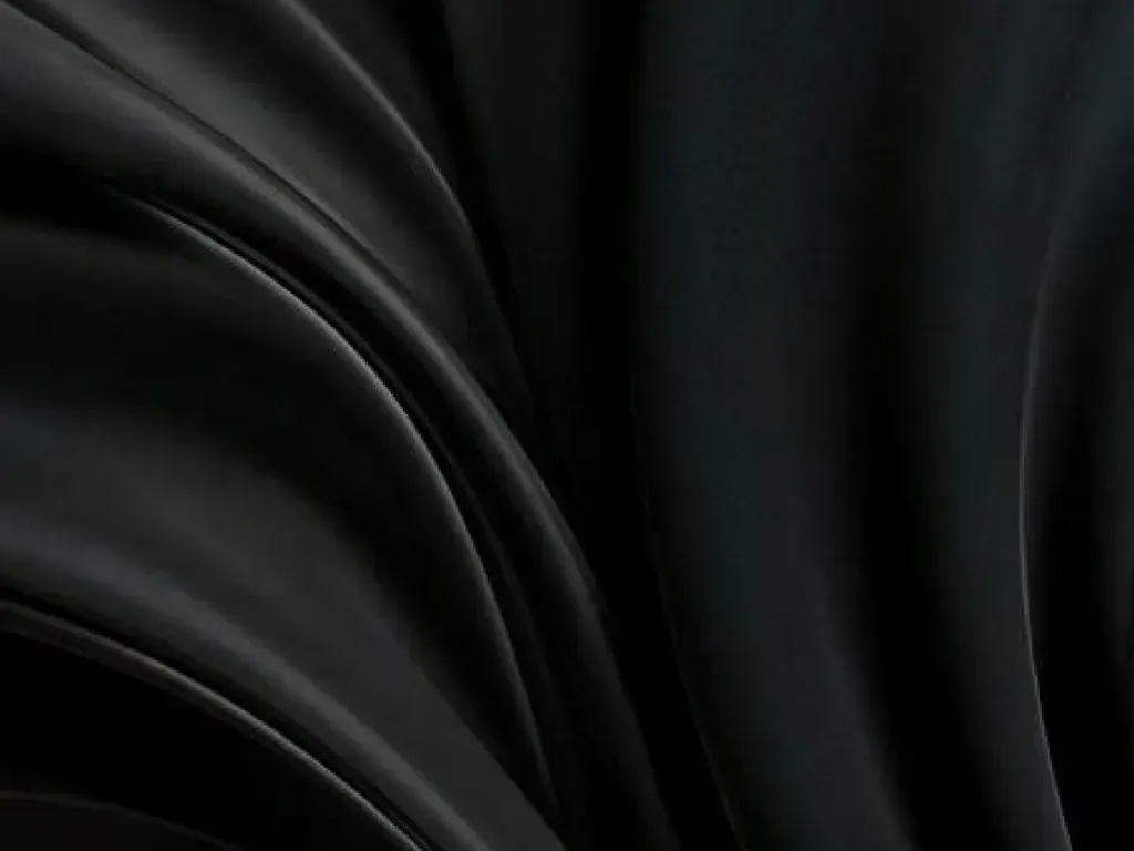 Wave clothes like texture in black color.